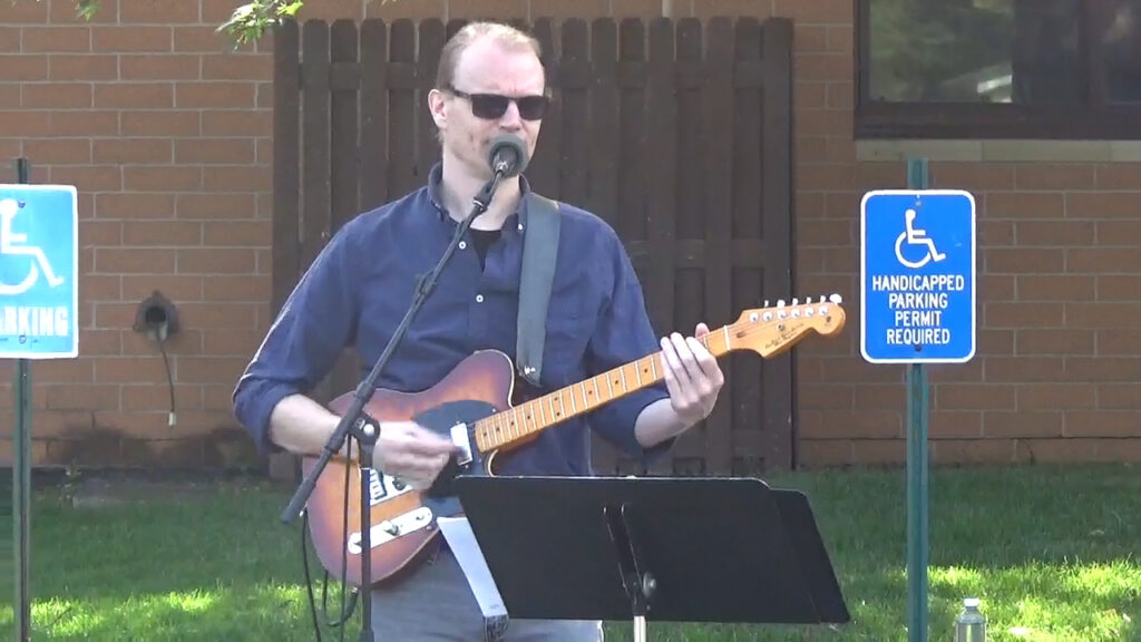 steve playing guitar